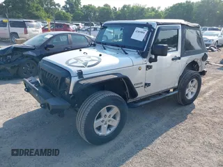 2012 Jeep Wrangler Sport z VIN 1C4AJWAG9CL255278, wystawiony jako IAAI lot #42469091 z przebiegiem 140 480 mil mil oraz . Historia ofert i sprzedaży dostępna na DreamBid. Obrazek 18.