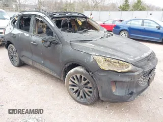 2020 Ford Escape Titanium z VIN 1FMCU9J95LUB42775, wystawiony jako IAAI lot #41997633 z przebiegiem Nie podano mil oraz . Historia ofert i sprzedaży dostępna na DreamBid. Obrazek 1.