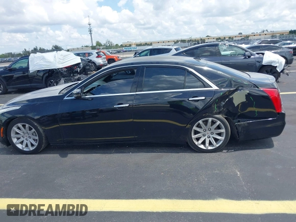 2014 Cadillac CTS RWD with VIN 1G6AP5SX0E0185913, listed as a IAAI auction lot 42685622 with 107,406 mi miles and . Bid and sale history available at DreamBid. Image 14.