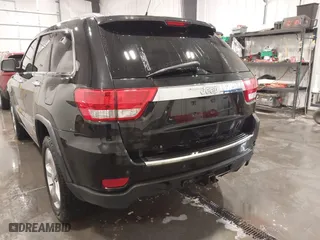 2011 Jeep Grand Cherokee Overland with VIN 1J4RR6GT7BC607735, listed as a IAAI auction lot 41830669 with 98,161 mi miles. Bid and sale history available at carsss.com. Image 6.