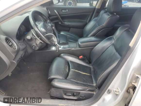 2012 Nissan Maxima SV с VIN 1N4AA5AP8CC864734, выставлен на аукционе Copart как лот 58805175 с пробегом 165 192 миль миль и Списание • Salvage title. История ставок и продаж доступна на DreamBid. Изображение 7.