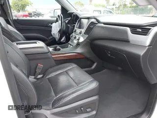 2019 GMC Yukon SLT with VIN 1GKS2BKC3KR160060, listed as a IAAI auction lot 42042122 with 124,733 mi miles. Bid and sale history available at carsss.com. Image 5.