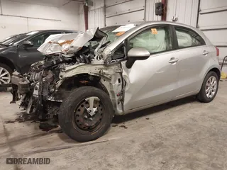 2013 Kia Rio LX with VIN KNADM5A31D6274318, listed as a IAAI auction lot 40986091 with 182,000 mi miles. Bid and sale history available at carsss.com. Image 20.