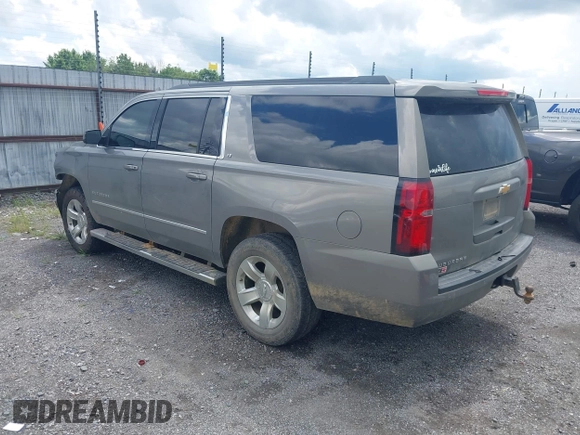 2017 Chevrolet Suburban LT with VIN 1GNSKHKC7HR356677, listed as a IAAI auction lot 42491581 with 129,496 mi miles and . Bid and sale history available at DreamBid. Image 3.