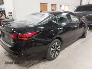 2019 Nissan Altima SL with VIN 1N4BL4EW6KC185215, listed as a IAAI auction lot 41135202 with 77,428 mi miles and . Bid and sale history available at carsss.com. Image 4.