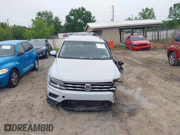 2018 Volkswagen Tiguan S with VIN 3VV1B7AX0JM041120, listed as a IAAI auction lot 42219662 with 160,852 mi miles and . Bid and sale history available at DreamBid. Image 12.