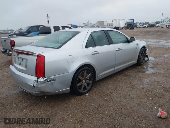 2010 Cadillac STS AWD z VIN 1G6DU6EV4A0114410, wystawiony jako IAAI lot #41301240 z przebiegiem 120 023 mil mil oraz . Historia ofert i sprzedaży dostępna na DreamBid. Obrazek 4.