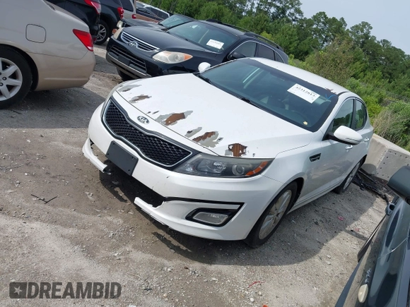 2015 Kia Optima LX z VIN 5XXGM4A76FG399865, wystawiony jako IAAI lot #42312813 z przebiegiem 207 747 mil mil oraz . Historia ofert i sprzedaży dostępna na DreamBid. Obrazek 2.
