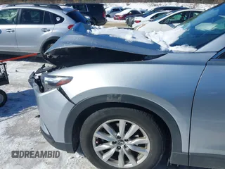 2016 Mazda CX-9 Sport with VIN JM3TCBBYXG0117878, listed as a IAAI auction lot 41617757 with 114,231 mi miles. Bid and sale history available at carsss.com. Image 6.