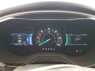 2013 Ford Fusion SE Hybrid z VIN 3FA6P0LU2DR104182, wystawiony jako Copart lot #63107545 z przebiegiem 249 317 mil mil oraz Szkoda całkowita • Salvage title. Historia ofert i sprzedaży dostępna na DreamBid. Obrazek 9.