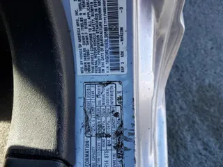 2003 Honda Civic LX with VIN 1HGEM21563L065861, listed as a Copart auction lot 41876845 with 233,101 mi miles and Salvage Title. Bid and sale history available at DreamBid. Image 12.