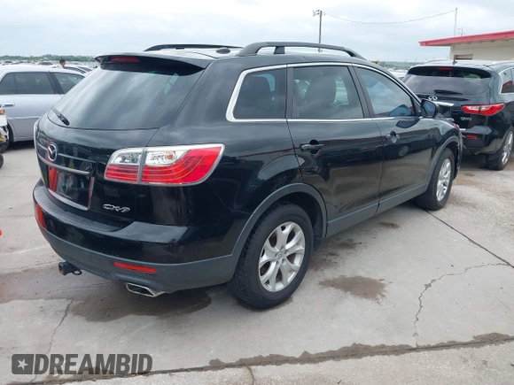 2012 Mazda CX-9 Touring with VIN JM3TB2CA4C0338312, listed as a IAAI auction lot 42113412 with 171,186 mi miles and . Bid and sale history available at carsss.com. Image 4.