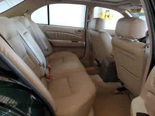1999 Nissan Maxima GXE z VIN JN1CA21D0XT808755, wystawiony jako Copart lot #49693685 z przebiegiem 63 389 mil mil oraz Szkoda całkowita • Salvage title. Historia ofert i sprzedaży dostępna na DreamBid. Obrazek 10.