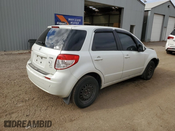 2009 Suzuki SX4 with VIN JS2YA411895100156, listed as a Copart auction lot 77779704 with 235,846 mi miles and Salvage Title. Bid and sale history available at carsss.com. Image 2.