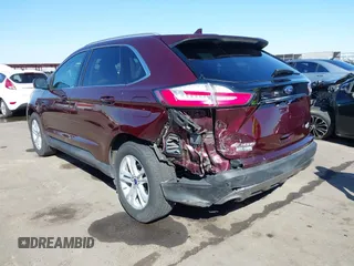 2019 Ford Edge SEL z VIN 2FMPK4J9XKBB10449, wystawiony jako IAAI lot #41614536 z przebiegiem 83 879 mil mil oraz . Historia ofert i sprzedaży dostępna na DreamBid. Obrazek 3.