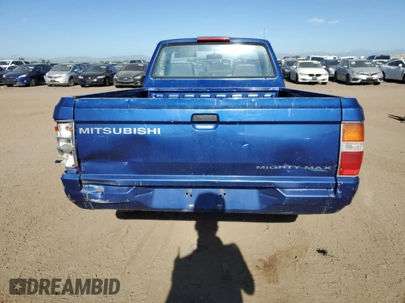 1994 Mitsubishi Mighty Max z VIN JA7LS21G4RP009588, wystawiony jako Copart lot #60519834 z przebiegiem 123 918 mil mil oraz Szkoda całkowita • Salvage title. Historia ofert i sprzedaży dostępna na DreamBid. Obrazek 6.