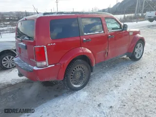 2011 Dodge Nitro Heat with VIN 1D4PU4GK3BW605831, listed as a IAAI auction lot 41346825 with 144,855 mi miles. Bid and sale history available at carsss.com. Image 4.