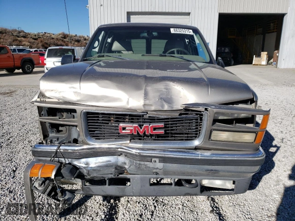 1998 GMC Yukon with VIN 1GKEK13R1WR508227, listed as a Copart auction lot 88325315 with 238,085 mi miles and Salvage Title. Bid and sale history available at carsss.com. Image 5.