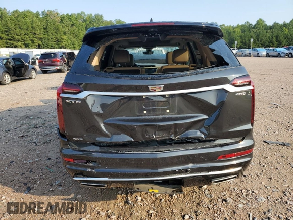 2020 Cadillac XT6 AWD Premium Luxury with VIN 1GYKPFRSXLZ208635, listed as a Copart auction lot 69057844 with 30,946 mi miles and Salvage Title. Bid and sale history available at carsss.com. Image 6.