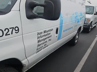 2012 Ford Econoline Cargo Commercial with VIN 1FTNE1EL2CDA18495, listed as a IAAI auction lot 42175469 with 248,092 mi miles and . Bid and sale history available at carsss.com. Image 26.