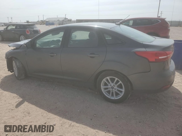 2017 Ford Focus SE with VIN 1FADP3F21HL308222, listed as a Copart auction lot 50707285 with 87,111 mi miles and Salvage title. Bid and sale history available at DreamBid. Image 2.