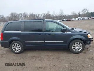 2014 Chrysler Town & Country Touring with VIN 2C4RC1BG6ER348090, listed as a IAAI auction lot 41687678 with 140,192 mi miles. Bid and sale history available at carsss.com. Image 13.