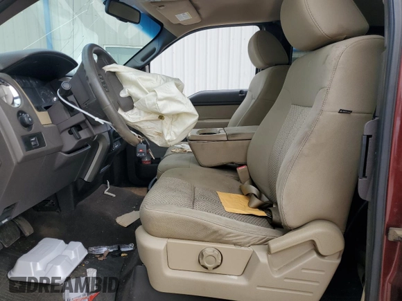 2010 Ford F-150 XL with VIN 1FTEX1C84AFB07754, listed as a Copart auction lot 55527995 with 236,226 mi miles and Salvage title. Bid and sale history available at DreamBid. Image 7.