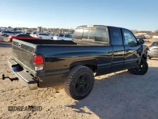 1999 Dodge 1500 with VIN 3B7HC12Y1XG199438, listed as a Copart auction lot 88346955 with 230,867 mi miles and Salvage Title. Bid and sale history available at DreamBid. Image 3.