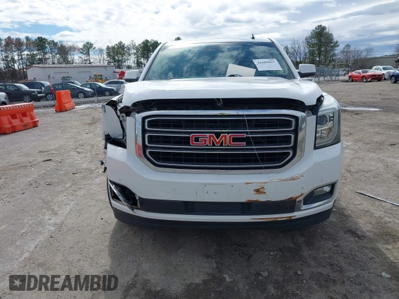 2015 GMC Yukon XL SLT with VIN 1GKS1HKC7FR126375, listed as a IAAI auction lot 41689017 with 218,622 mi miles. Bid and sale history available at carsss.com. Image 12.