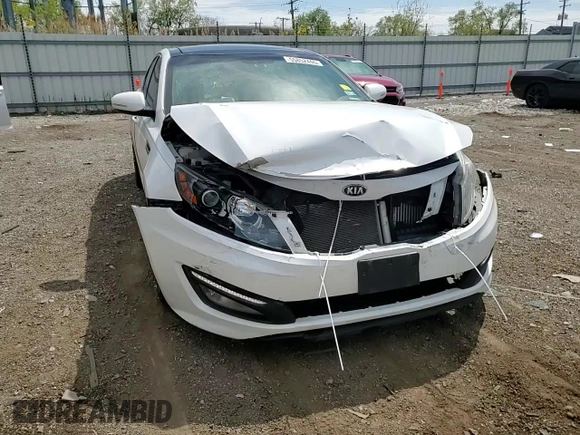 2013 Kia Optima SX z VIN 5XXGR4A61DG152999, wystawiony jako Copart lot #55852445 z przebiegiem 124 825 mil mil oraz Szkoda całkowita • Salvage title. Historia ofert i sprzedaży dostępna na DreamBid. Obrazek 13.