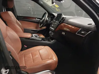 2018 Mercedes-Benz GLS 550 with VIN 4JGDF7DE1JB070994, listed as a IAAI auction lot 41676076 with 104,748 mi miles and . Bid and sale history available at DreamBid. Image 5.