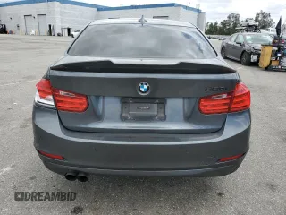 2015 BMW 3 Series 328i z VIN WBA3C1C59FK122223, wystawiony jako Copart lot #56991615 z przebiegiem 83 519 mil mil oraz Szkoda całkowita • Salvage title. Historia ofert i sprzedaży dostępna na DreamBid. Obrazek 6.