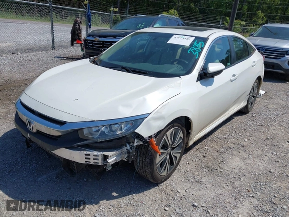 2018 Honda Civic EX-L with VIN 19XFC1F72JE002269, listed as a IAAI auction lot 41973885 with 130,979 mi miles and . Bid and sale history available at DreamBid. Image 1.