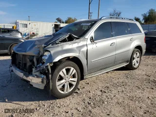 2010 Mercedes-Benz GL-Class GL 450 with VIN 4JGBF7BE6AA606161, listed as a Copart auction lot 82145924 with 173,729 mi miles and Salvage Title. Bid and sale history available at carsss.com. Image 1.