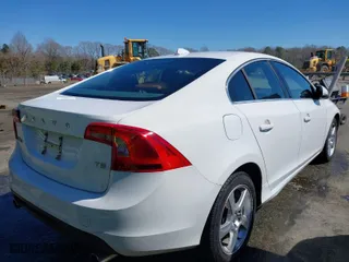 2013 Volvo S60 T5 Premier with VIN YV1612FS3D1227835, listed as a IAAI auction lot 41833680 with 136,776 mi miles. Bid and sale history available at carsss.com. Image 4.