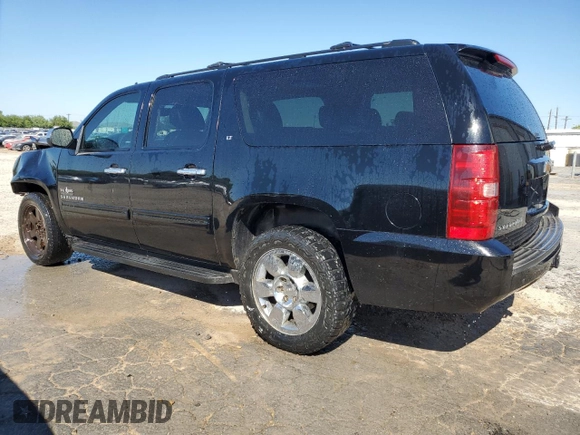 2014 Chevrolet Suburban LT with VIN 1GNSCJE04ER156583, listed as a Copart auction lot 73730364 with 243,131 mi miles and Clean Title. Bid and sale history available at carsss.com. Image 2.