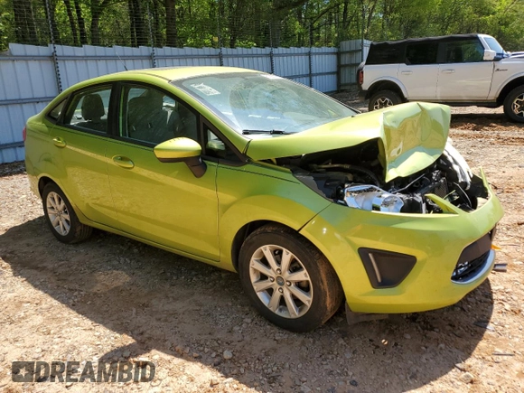 2012 Ford Fiesta SE z VIN 3FADP4BJ7CM164850, wystawiony jako Copart lot #51680925 z przebiegiem 184 884 mil mil oraz Szkoda całkowita • Salvage title. Historia ofert i sprzedaży dostępna na DreamBid. Obrazek 4.