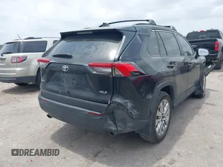 2023 Toyota RAV4 XLE Premium with VIN 2T3C1RFV9PC250006, listed as a IAAI auction lot 42298396 with 17,309 mi miles and . Bid and sale history available at DreamBid. Image 4.