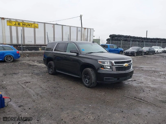 2015 Chevrolet Tahoe Commercial with VIN 1GNSK2EC8FR570602, listed as a IAAI auction lot 41977021 with 115,866 mi miles. Bid and sale history available at carsss.com. Image 1.