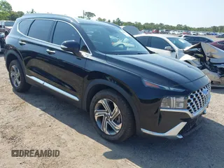 2021 Hyundai Santa Fe SEL z VIN 5NMS64AJ3MH331523, wystawiony jako IAAI lot #42201780 z przebiegiem 84 319 mil mil oraz . Historia ofert i sprzedaży dostępna na DreamBid. Obrazek 1.