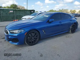 2020 BMW 8 Series 840i with VIN WBAGV2C01LCD29736, listed as a Copart auction lot 57632994 with 36,157 mi miles and Salvage Title. Bid and sale history available at carsss.com. Image 1.