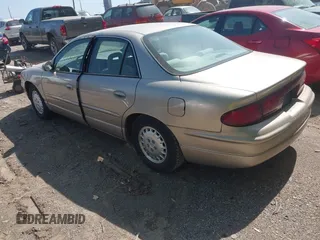1997 Buick Regal LS with VIN 2G4WB52K9V1435882, listed as a IAAI auction lot 42135703 with 64,434 mi miles. Bid and sale history available at carsss.com. Image 3.
