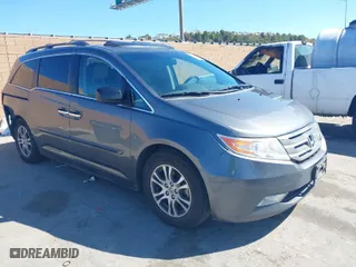 2011 Honda Odyssey EX-L with VIN 5FNRL5H68BB092628, listed as a IAAI auction lot 41820351 with 243,538 mi miles. Bid and sale history available at carsss.com. Image 1.