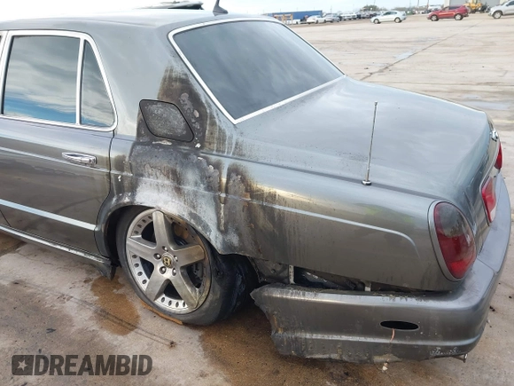 2004 Bentley Arnage with VIN SCBLF34F44CX09842, listed as a IAAI auction lot 41349014 with Not Provided miles and . Bid and sale history available at DreamBid. Image 6.