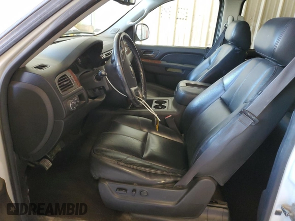 2014 Chevrolet Suburban LT with VIN 1GNSCJE02ER202427, listed as a Copart auction lot 71253834 with 247,515 mi miles and Clean Title. Bid and sale history available at carsss.com. Image 7.