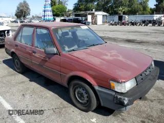 1986 Toyota Corolla with VIN JT2AE82EXG3386120, listed as a Copart auction lot 59397245 with 276,586 mi miles and Salvage title. Bid and sale history available at DreamBid. Image 4.