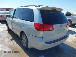 2006 Toyota Sienna XLE with VIN 5TDZA22C06S504271, listed as a IAAI auction lot 41573903 with 208,712 mi miles. Bid and sale history available at carsss.com. Image 3.