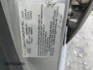 2002 Chevrolet Tracker z VIN 2CNBE13C926934704, wystawiony jako Copart lot #70717194 z przebiegiem 189 076 mil mil oraz Szkody całkowita. Historia ofert i sprzedaży dostępna na DreamBid. Obrazek 12.