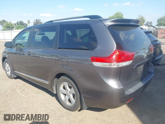 2014 Toyota Sienna LE AAS with VIN 5TDKK3DC0ES498732, listed as a IAAI auction lot 42077044 with 189,745 mi miles and . Bid and sale history available at carsss.com. Image 3.