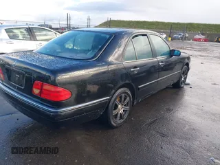 1997 Mercedes-Benz E-Class with VIN WDBJF72F1VA281514, listed as a IAAI auction lot 41586496 with 283,212 mi miles. Bid and sale history available at carsss.com. Image 4.